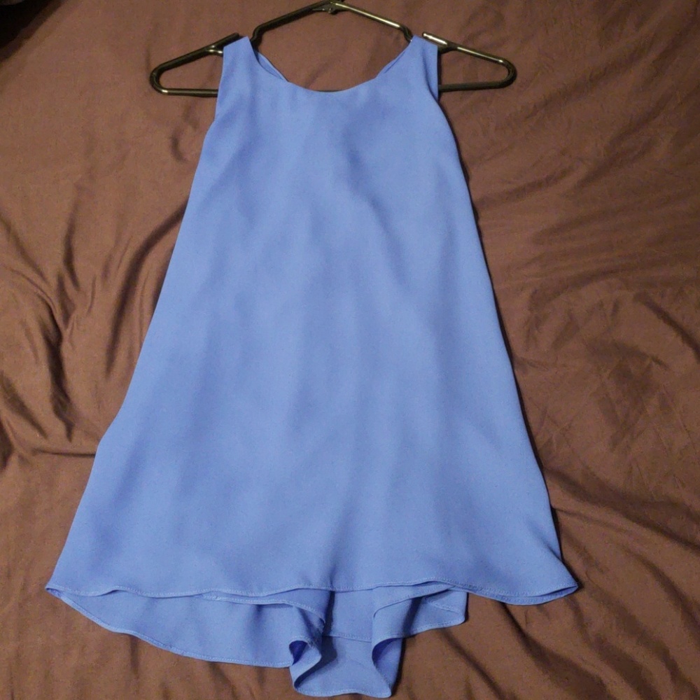 Slight high low top